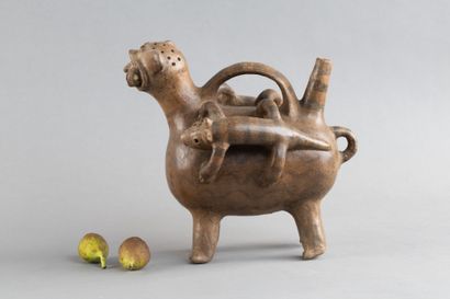 A whistling vase depicting a feline, whose...