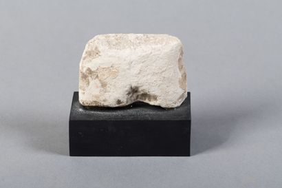 Upper part of a votive statuette depicting...