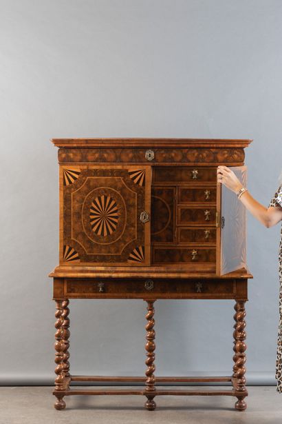 Cabinet with a front featuring one drawer...