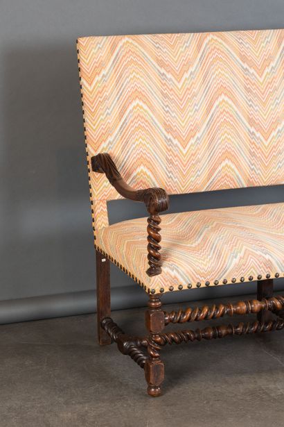 Walnut bench with leaf-motif armrests and...