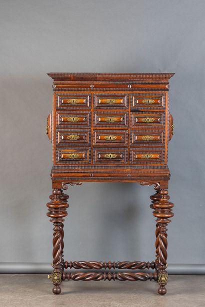 A cabinet known as a “Contador,” made of...