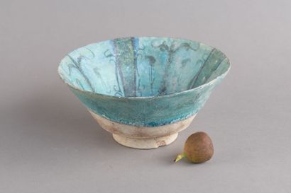 A beautiful ceramic bowl with black decoration...