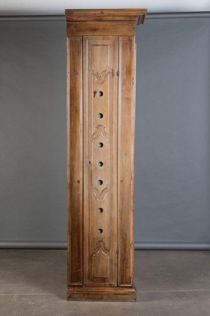 Molded walnut wardrobe with openwork paneled...