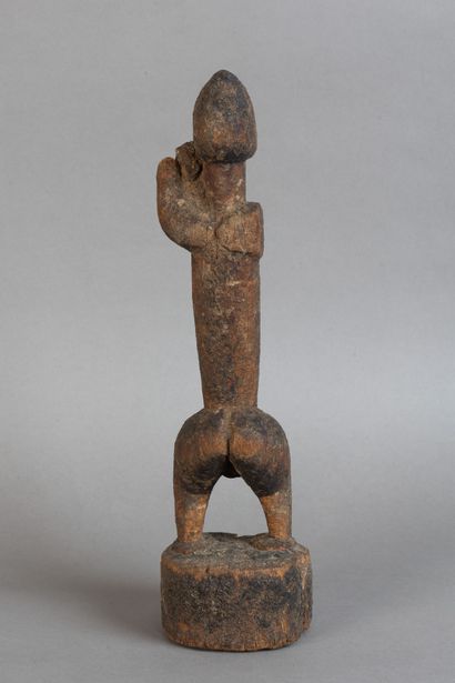 A strongly sexualized fetish, depicted standing...