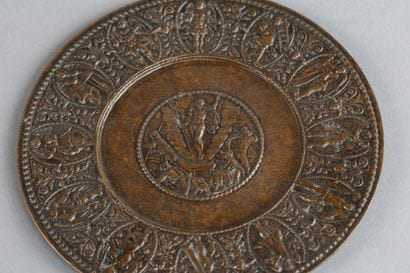 Bronze paten with a natural patina. Central...
