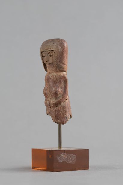 Bust of a female figurine. Terracotta with...