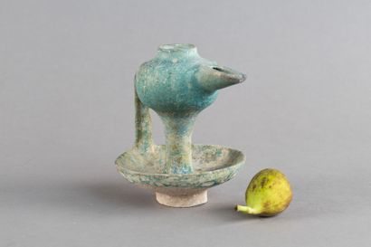 Turquoise ceramic oil lamp with a bulbous...