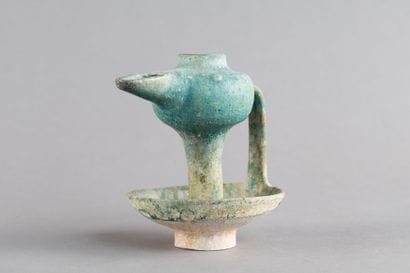 Turquoise ceramic oil lamp with a bulbous...