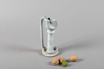 Oil lamp. Blue-glazed terracotta. Height:...