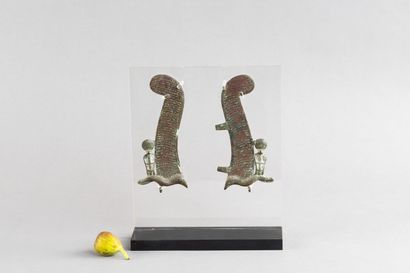 Pair of feathers flanked by cobras. Bronze....