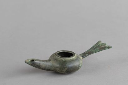 Bronze oil lamp with a long spout and a trilobed,...