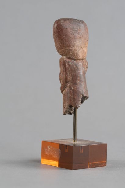 Bust of a female figurine. Terracotta with...