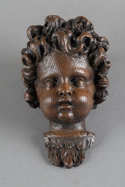 Carved oak cherub head, wall sconce element.
Northern...