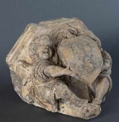 Carved limestone console with traces of polychromy,...