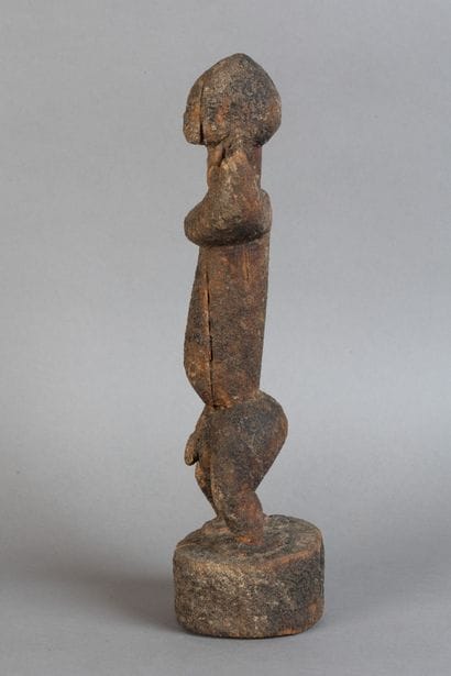 A strongly sexualized fetish, depicted standing...