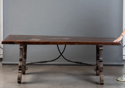 Large walnut table with a lyre-shaped base...