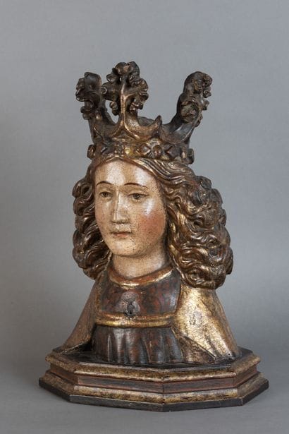 Carved, polychrome, and gilded wooden bust...