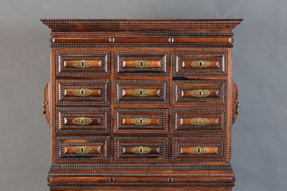 A cabinet known as a “Contador,” made of...