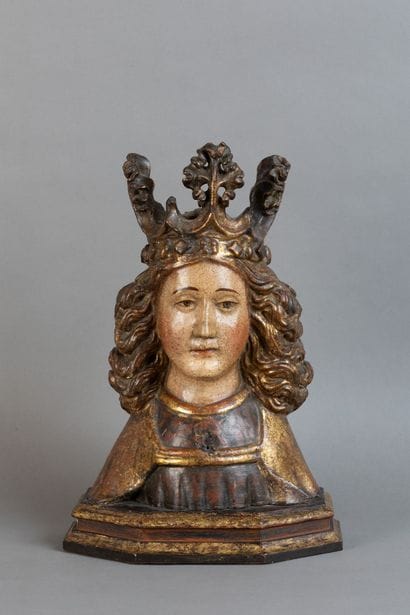 Carved, polychrome, and gilded wooden bust...