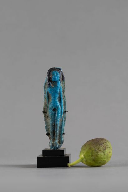 Statuette of a nude concubine with her arms...