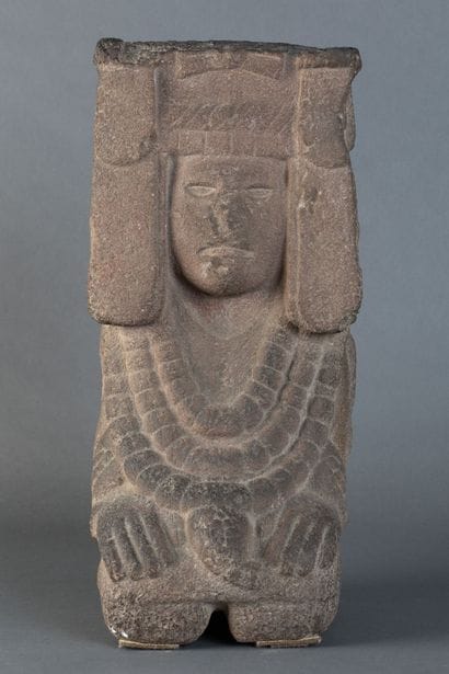 Goddess of corn. She is depicted seated with...