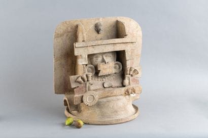 Lid of a censer. In the center, the face—adorned...