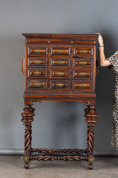 A cabinet known as a “Contador,” made of...