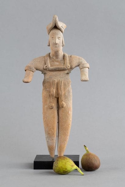 Statuette depicted in a standing position....