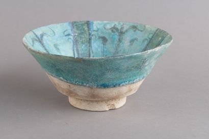 A beautiful ceramic bowl with black decoration...