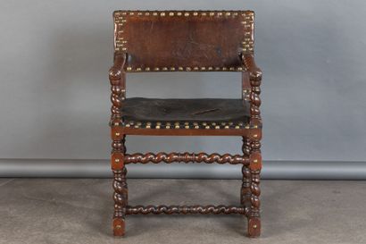 Armchair in molded walnut, with twisted armrests,...