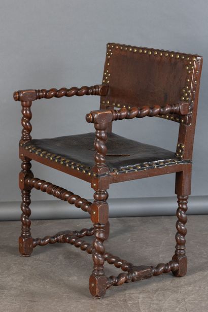 Armchair in molded walnut, with twisted armrests,...