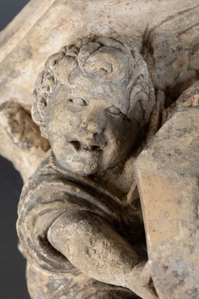 Carved limestone console with traces of polychromy,...