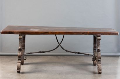 Large walnut table with a lyre-shaped base...
