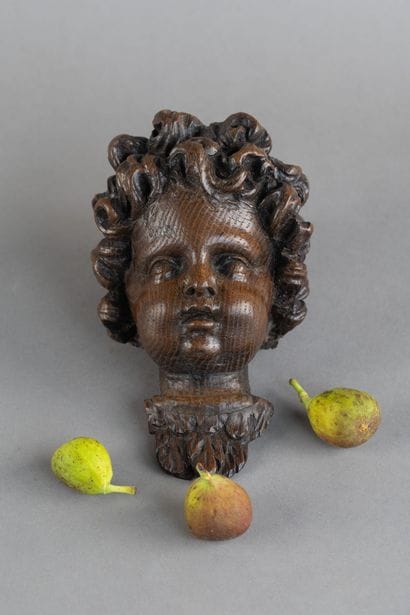 Carved oak cherub head, wall sconce element.
Northern...