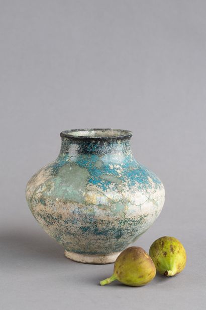 Bulbous ceramic vase with black decoration...