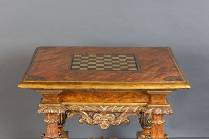 Lacquered and gilded wooden game table.
In...