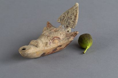 Lampe à huile en forme de tête de taureau....