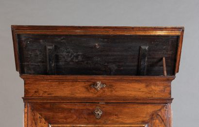 Walnut cabinet with secret compartments;...