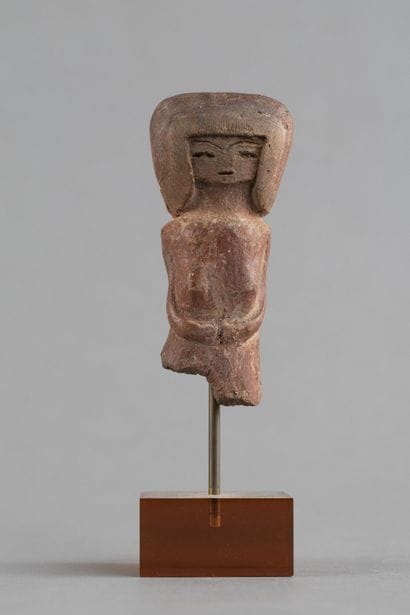 Bust of a female figurine. Terracotta with...