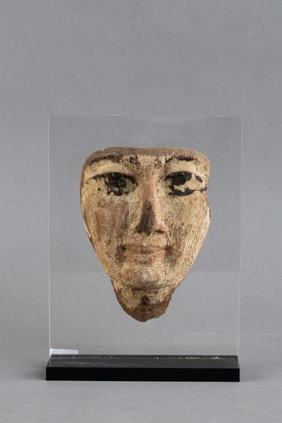 Anthropomorphic wooden sarcophagus mask....