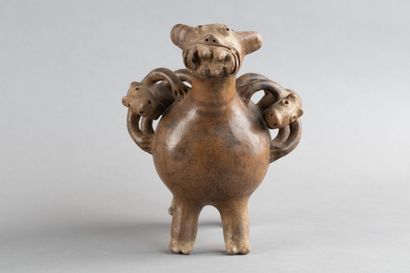 A whistling vase depicting a feline, whose...