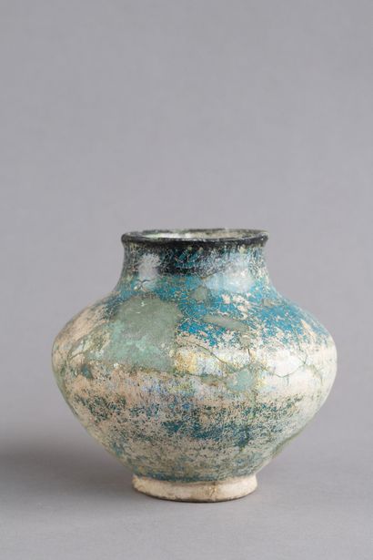 Bulbous ceramic vase with black decoration...