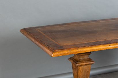 Walnut table with burl inlay; the tabletop...