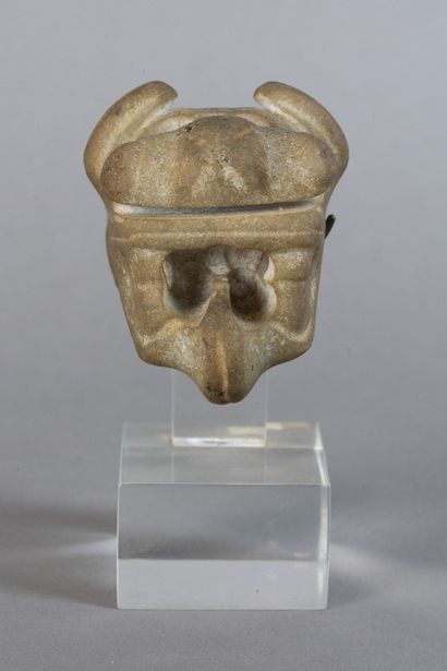 Zoomorphic weapon-shaped object depicting...