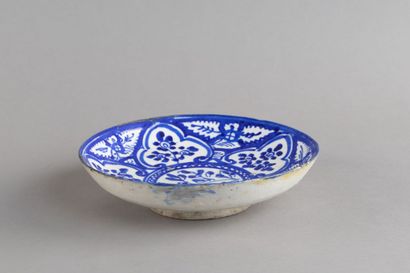 Ceramic plate decorated with blue-and-white...