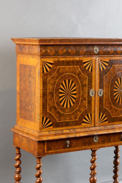 Cabinet with a front featuring one drawer...