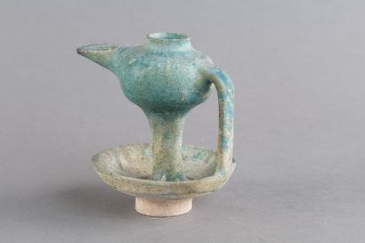 Turquoise ceramic oil lamp with a bulbous...
