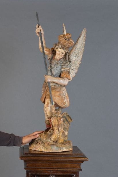 Carved, polychrome, and gilded wooden statue...