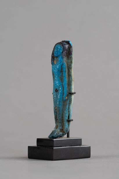 Statuette of a nude concubine with her arms...