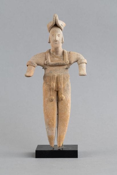 Statuette depicted in a standing position....